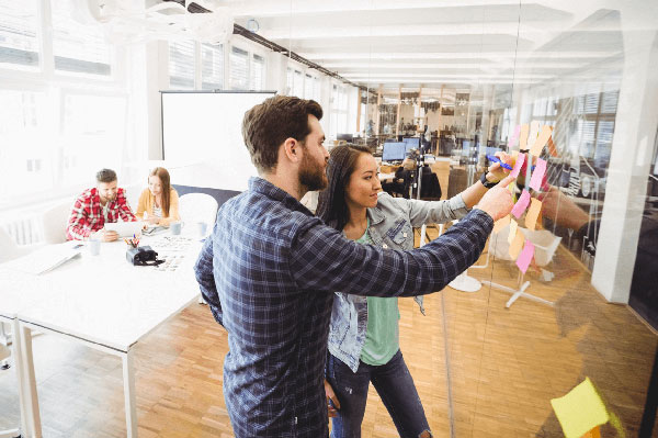 Click the photo of an Agile team at work to learn more about the Agile Accelerator team assessment. 