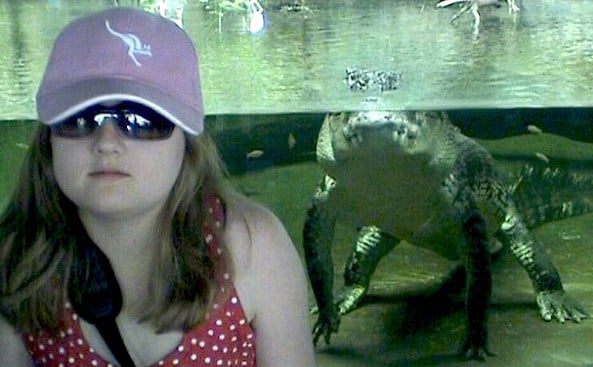 Ten-year-old Daniela gets photo-bombed by a croc while touring Aussie.