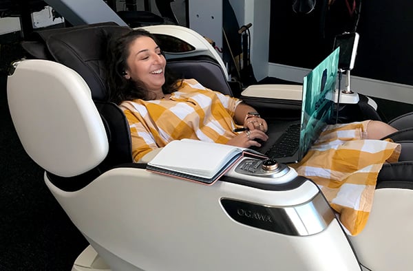 Maryam working in the massage chair.