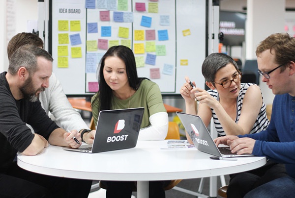 Click the image of a Scrum team to learn how a Product Owner can guide their team to success. 