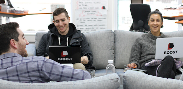 Boosters working together on the coach. Click to check out our careers page.